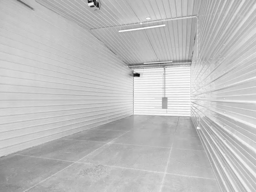 Interior heated contractor bay with garage door